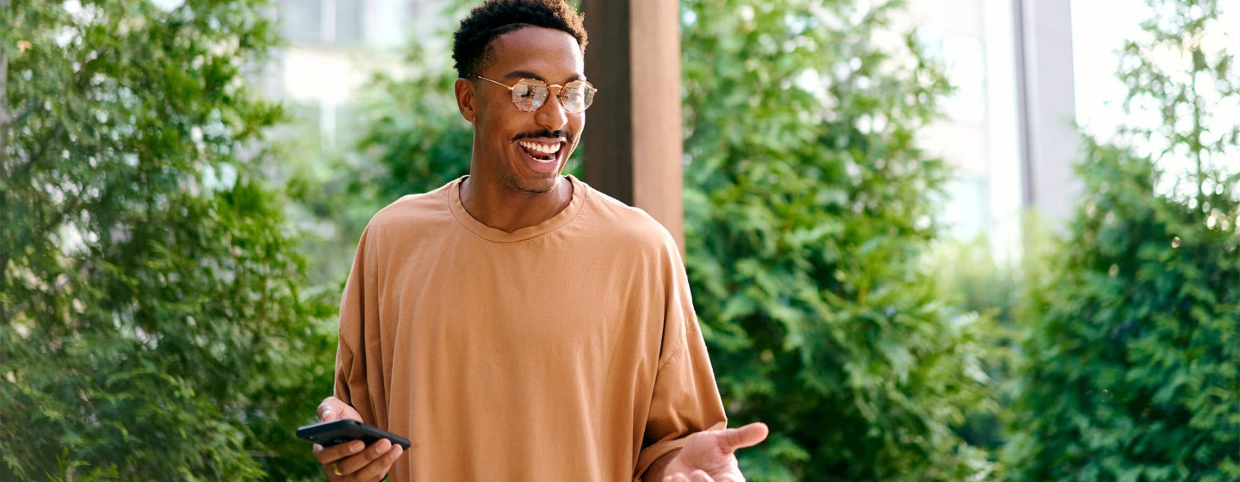 a man holding a phone