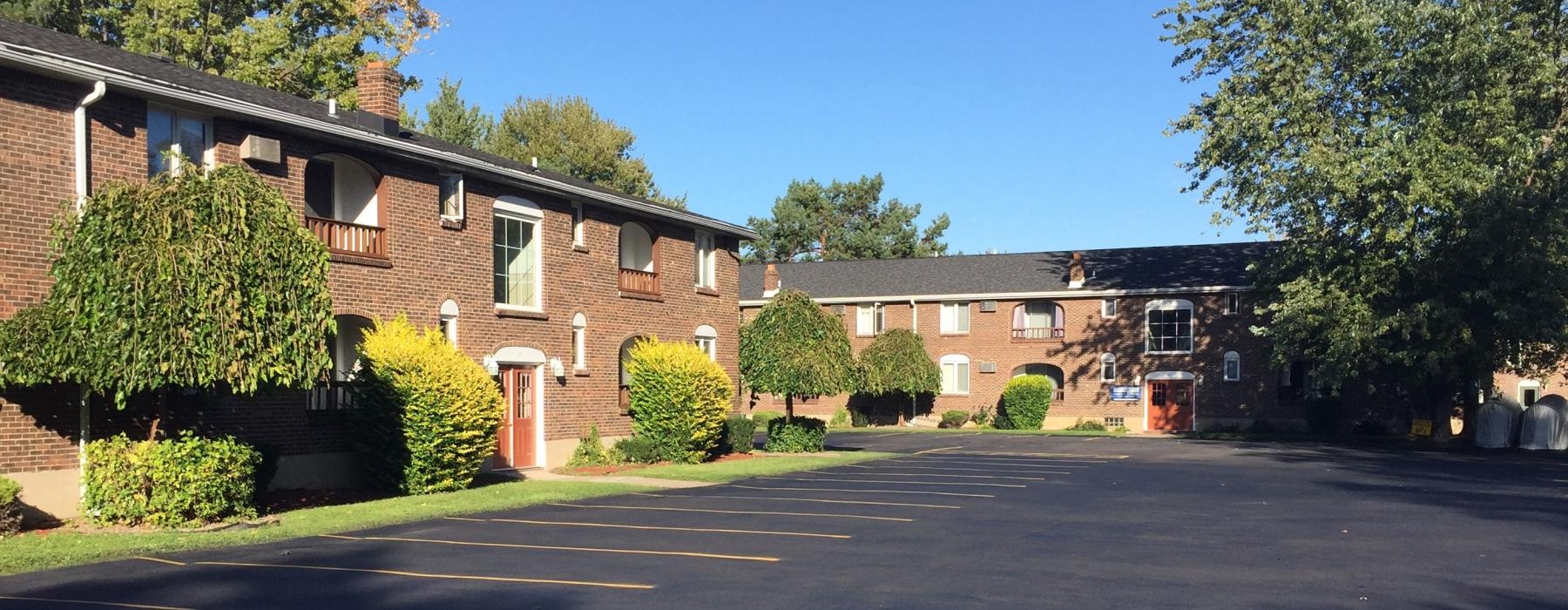 a street with houses and trees